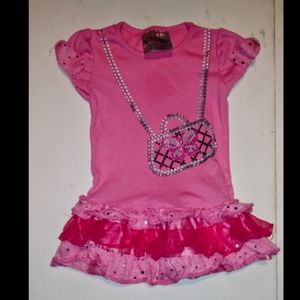 Shirt with a ruff tutu at the bottom